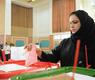 مواطنة بحرينية تدلي بصوتها